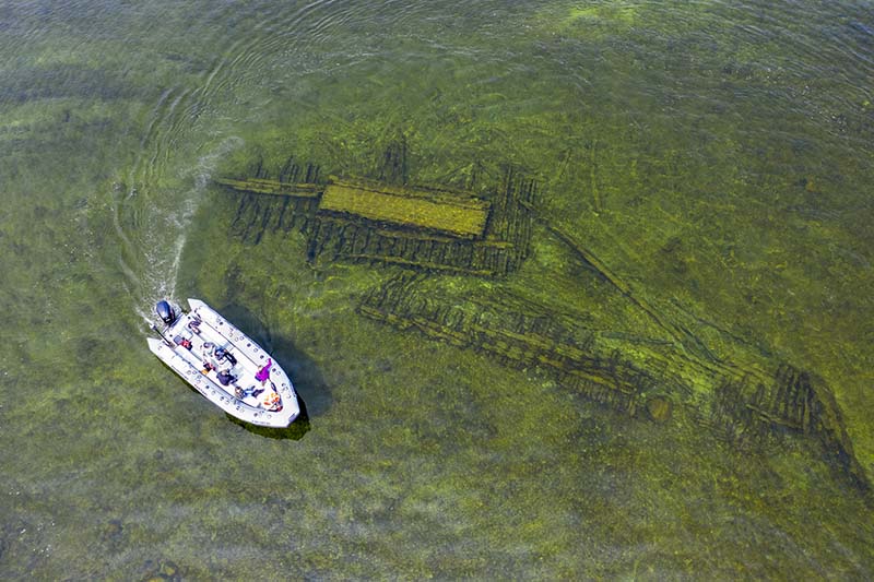 An aerial view of a raft floating over Grape Shot.