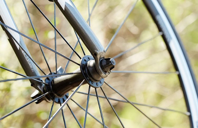 Closeup of a bike wheel.