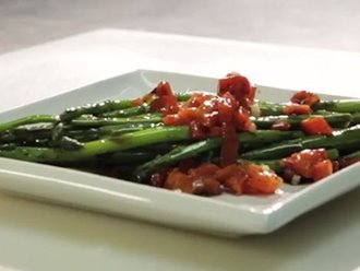 Roasted asparagus and bell peppers on a plate