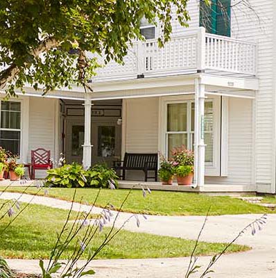 A quaint, old-fashioned inn with wide driveways and open porches.