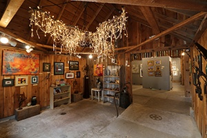 Interior of a wooden art gallery building.