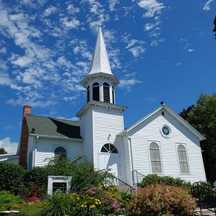 A small white church.