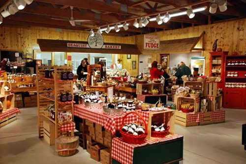 A quaint indoor farm market packed with local artisan goods.
