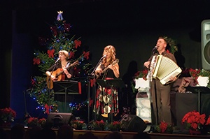 Musicians performing on stage at Christmas.