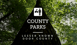 Trees with a text overlay that says "County Parks"