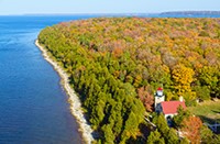 The eagle Bluff Lighthouse in fall from the air.