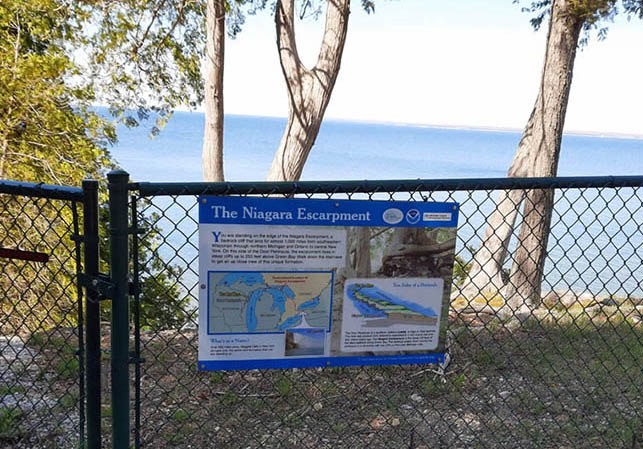 Fence and sign outside the Niagara Escarpment.