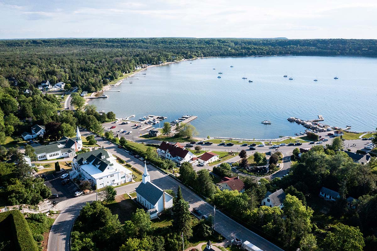 An aerial view of sparkling Eagle Harbor and surrounding shoreline.