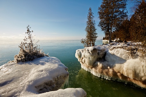 A frozen Cave Point in winter.