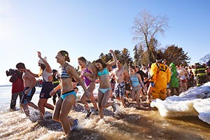 People at the lakefront in winter ready for a Polar Bear Plunge