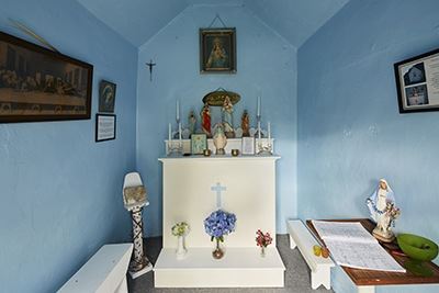 The interior of a small chapel.