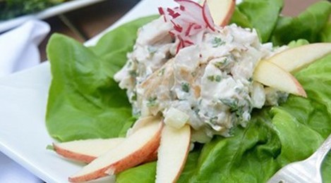 Plate of whitefish salad on a bed of lettuce.