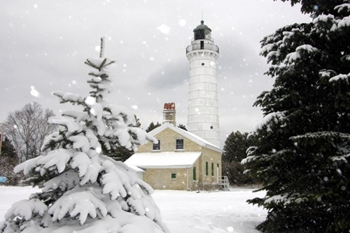 The Cana Island Lighthouse in the snow.