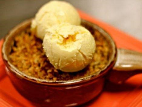 Apple crisp and ice cream in a bowl
