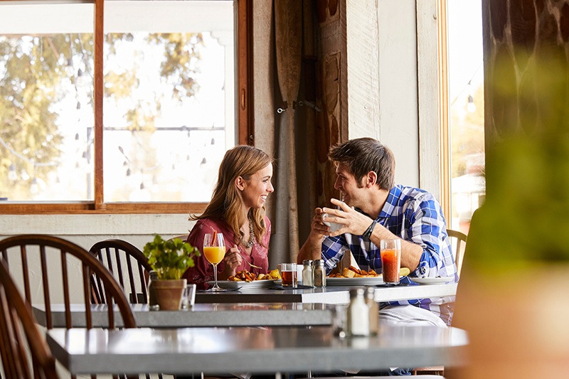 By the Numbers: The Door County Dining Scene A couples dine at brunch with mimosa and bloody marys