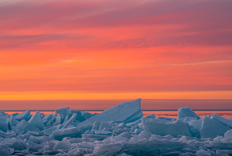 Winter Light: Why Door County Winter Sunsets are So Spectacular Icy sunrise in Door County.