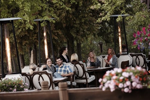 Supper Clubs: A Wisconsin Tradition A couple dines on the outdoor patio at the English Inn.