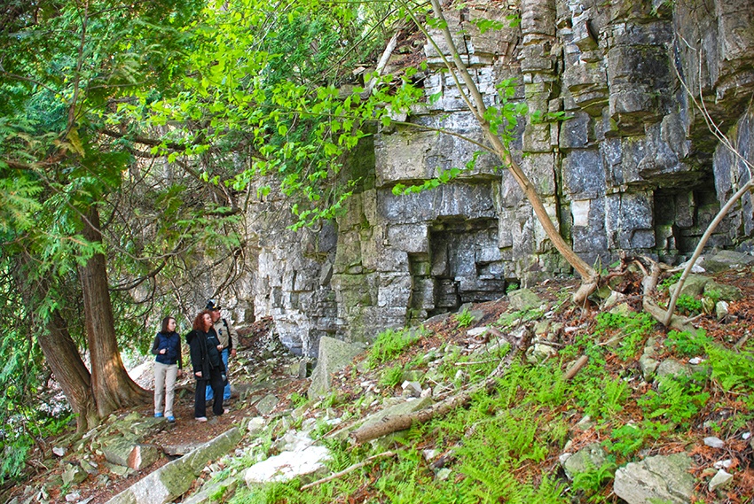 Geocaching: Naturalist Treasure Hunting A family hikes a trail along the Niagara Escarpment in search of geocaches