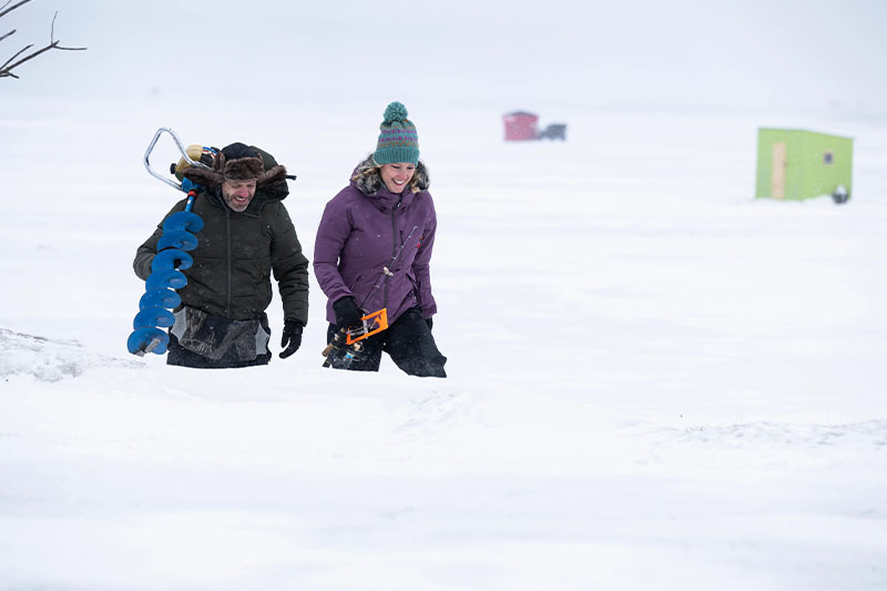 Ice Fishing in Door County A couple heads out to ice fish at George Pinney Park.