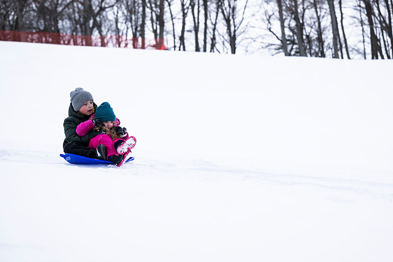 Winter Activities by Snow Type in Door County Sledding at Hill 17