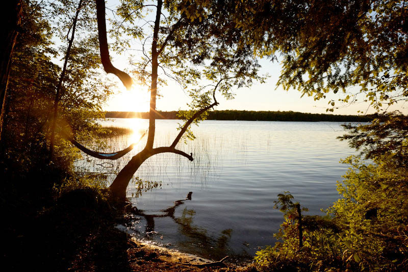 Best Hiking Trails in Door County State Parks Sunset over a small lake at Newport.