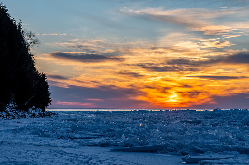 25 Things to Do During Winter in Door County One of the best winter things to do in Door County, the Door Bluff Headlands ice shove at sunset.