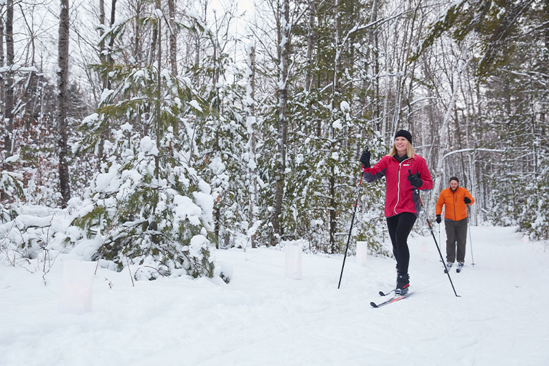 Things to Do this Valentine’s Day in Door County Couple cross country skiing at Peninsula State Park