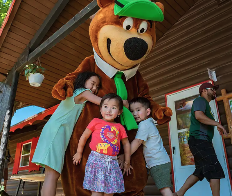 Door County Fall Camping Guide children hugging Yogi Bear