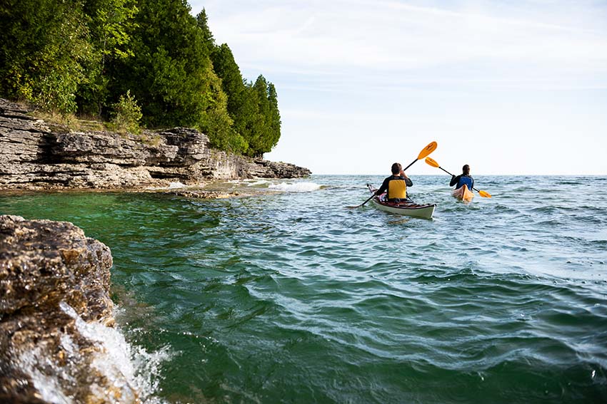 Boating, Sailing, & Paddling A couple kayaking
