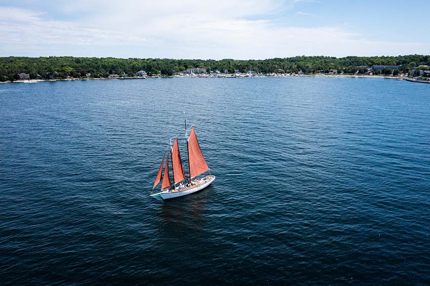 Boating, Sailing, & Paddling Sailboat on the lake