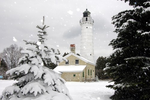 72-Hour Romantic Winter Getaway The Cana Island Lighthouse in the snow.
