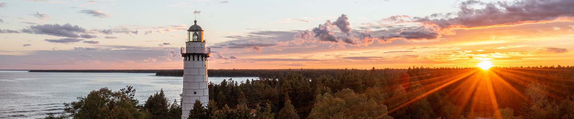Awards & Accolades Cana Island Lighthouse at sunset.