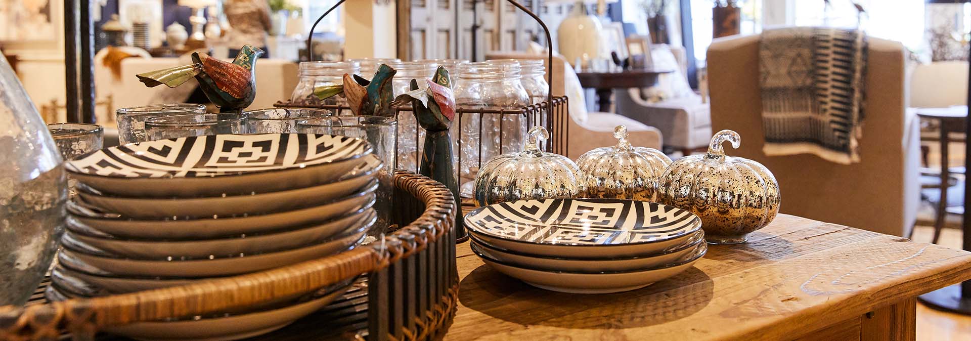 Boutiques, Retail, & Specialty Goods Plates and glassware on a table