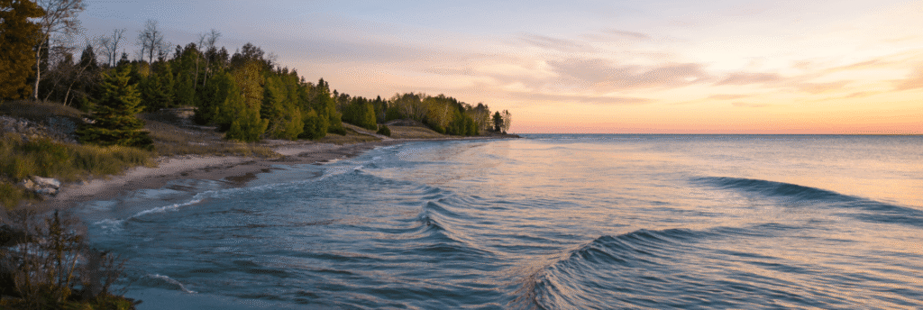 The Lake Michigan shoreline at sunset.
